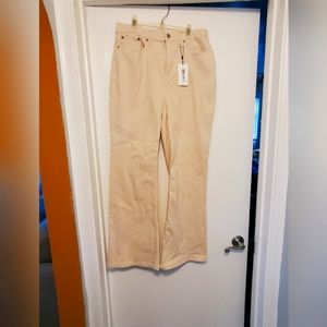 Calvin Klein cream wide legged jeans